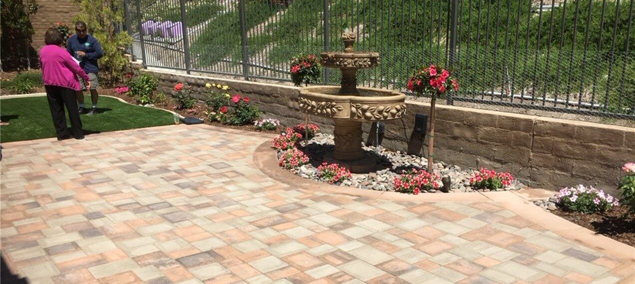 Complete backyard overhaul with pavers, vegetable garden, Triton turf, putting green, plants, concrete – water fountain – Rancho Mission Viejo Pavers, Concrete & Artificial Grass, Green-R Turf of Ventura
